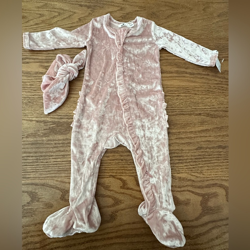 Pink ruffled one piece